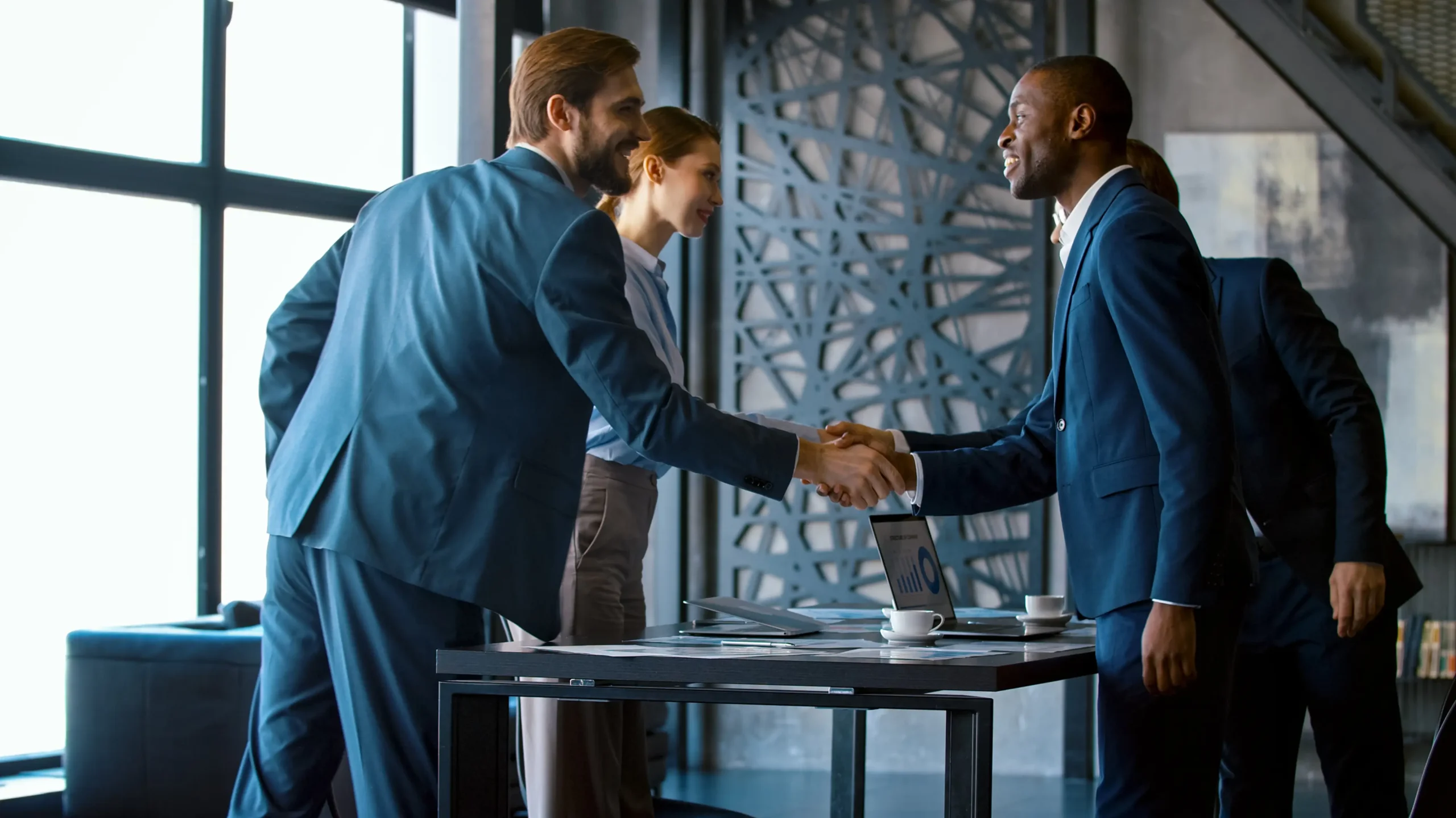 young-business-people-in-a-suits-at-meeting